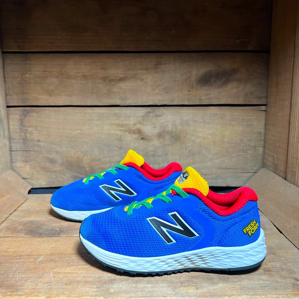 SOLDNew Balance Blue & Red Arishi v2 Sneakers Size 9.5
